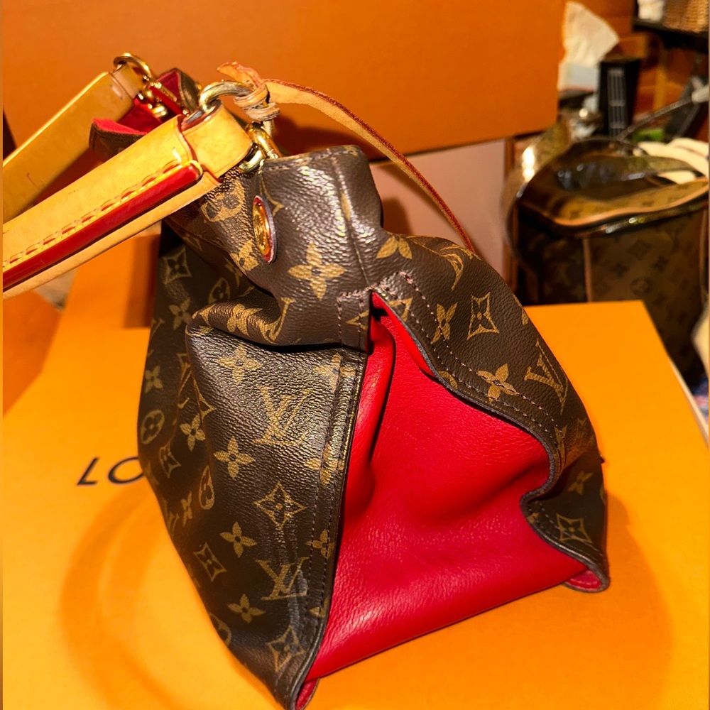 Louis Vuitton Gaia monogram with Red sides
